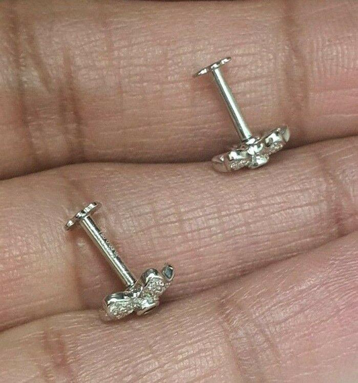 18ct White Gold Ruby & Diamond Earrings 0.20 cts Child friendly safe & secure