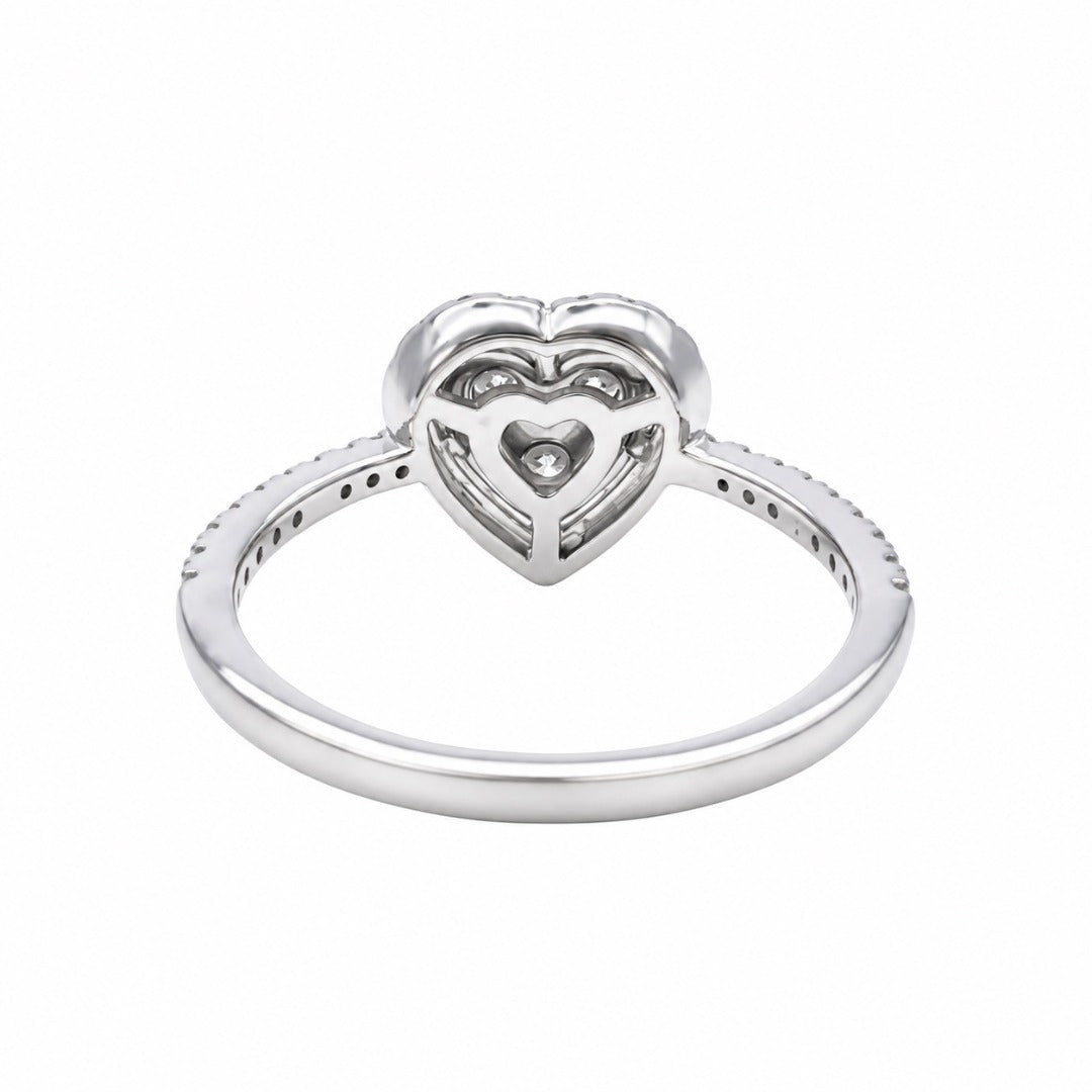 Close-up of heart halo diamond cluster on 18ct white gold ring, 10mm head