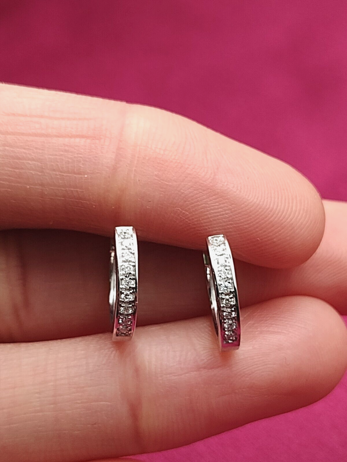 An Elegant Pair of Diamond Hoop Mini Earrings made in 14K White Gold, set with 0.19 carats