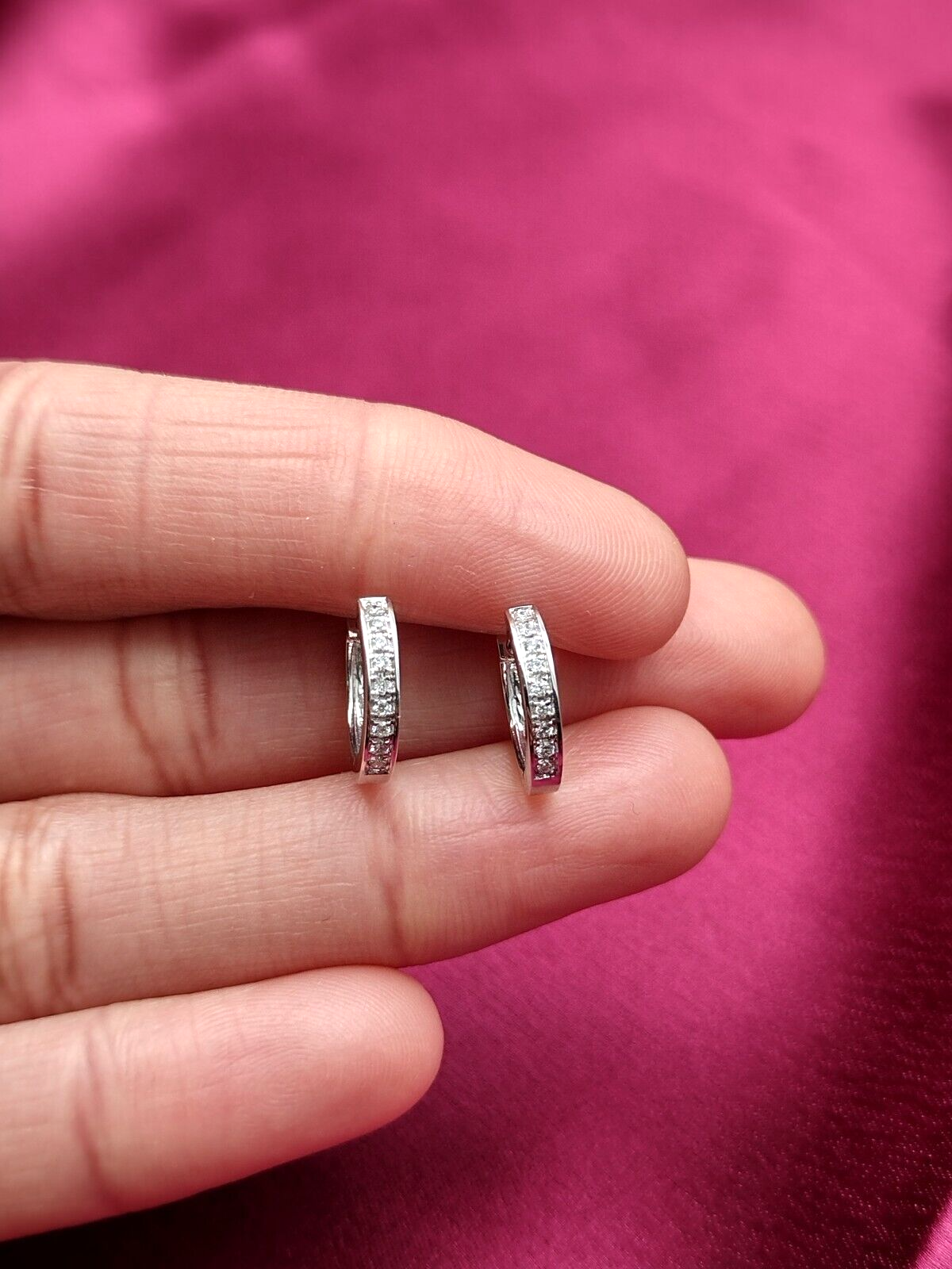 An Elegant Pair of Diamond Hoop Mini Earrings made in 14K White Gold, set with 0.19 carats