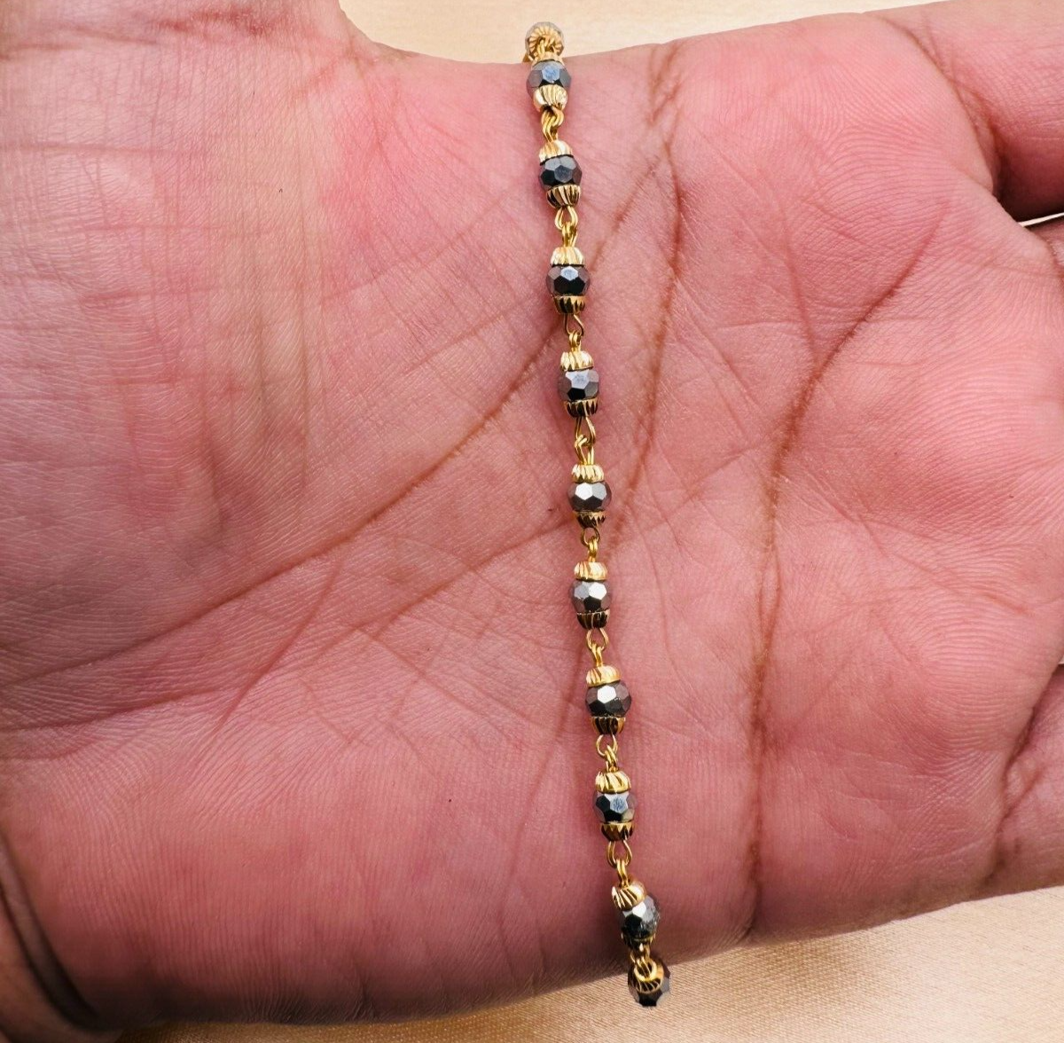 22ct Yellow Gold Baby Bracelet Black Gold Beads Maniya Manka Na Raina Jewels