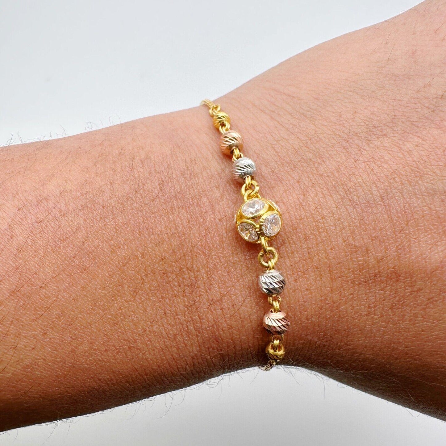 22ct Yellow Gold Three Colour Diamond Cut Beaded Drawstring Bracelet, 5.39gm