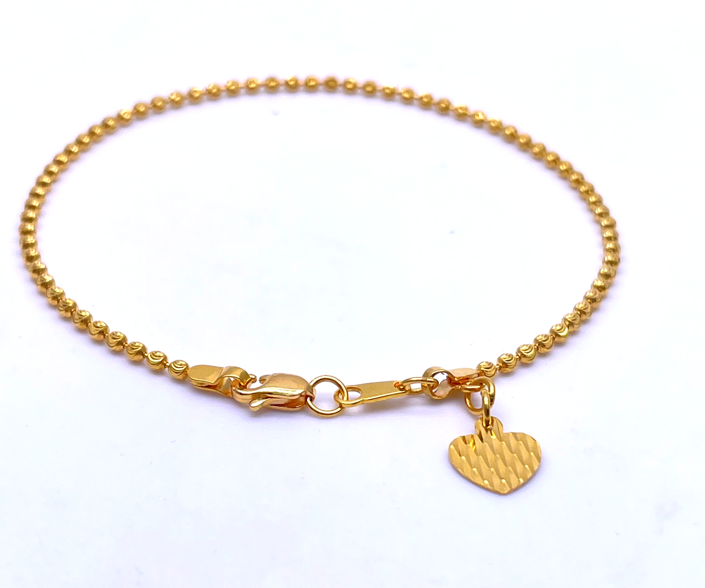 22ct Yellow Gold Diamond Cut Shiny Beaded Bracelet With Heart Charm 7''inches