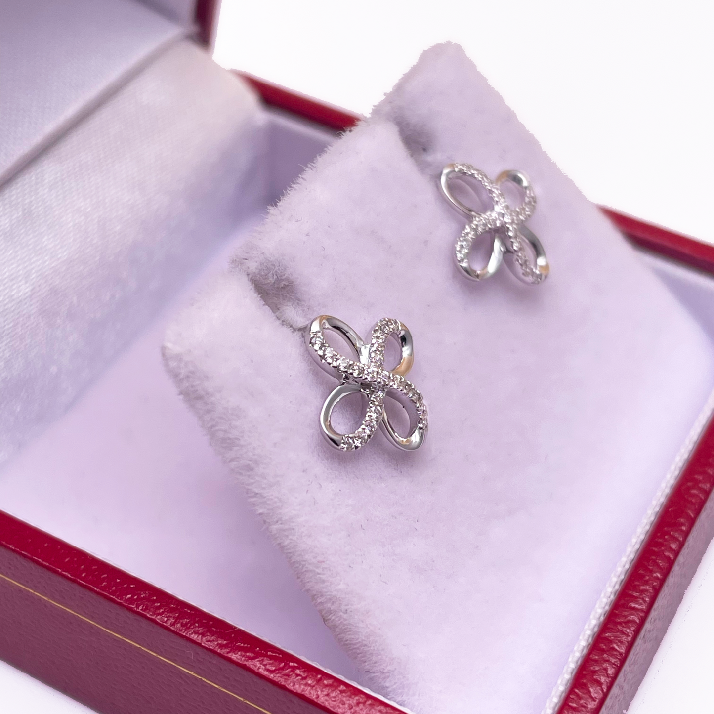 18ct White Gold Swirl Infinity Diamond Earrings 0.11ct