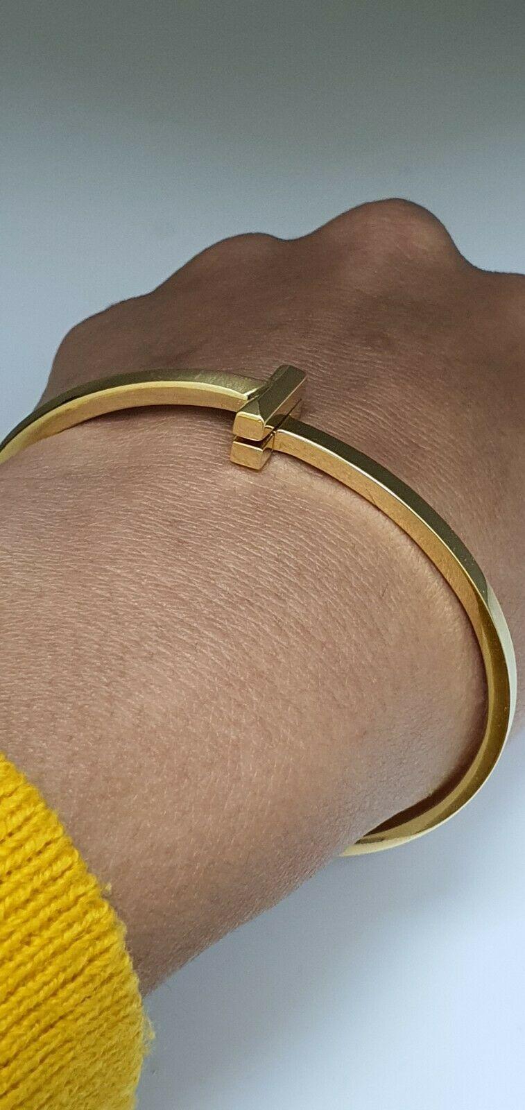 18Carat Yellow Gold T Square Hinged Bangle 21 Grams